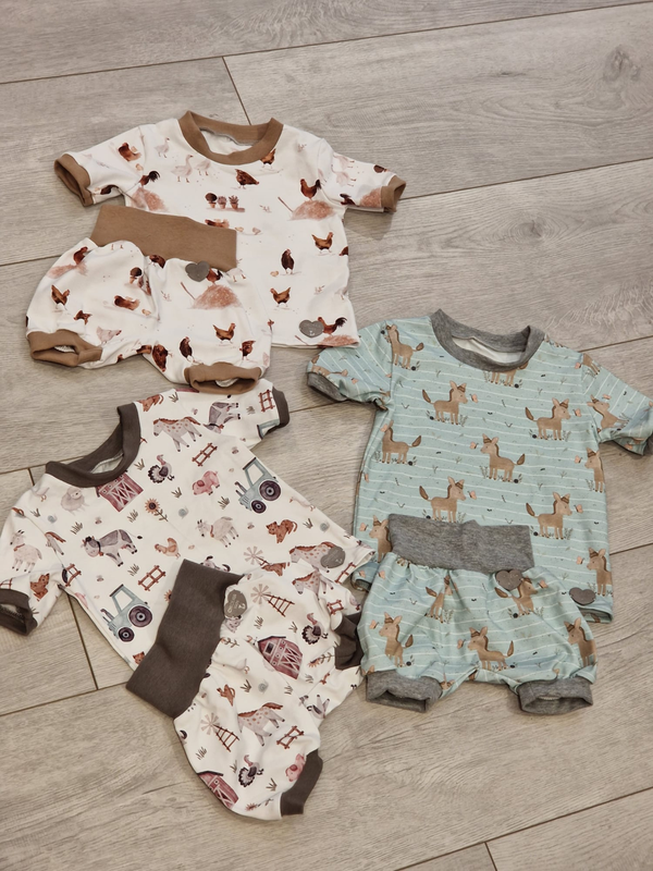 Handgefertigte Kinder-& Babykleidung aus Baumwolle